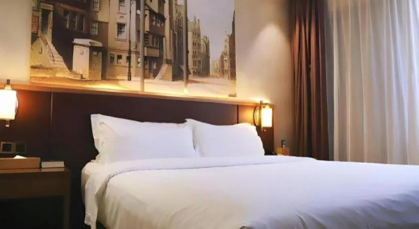 Bed in James Joyce Coffetel Guangzhou Dongxiaonan Metro Station Branch