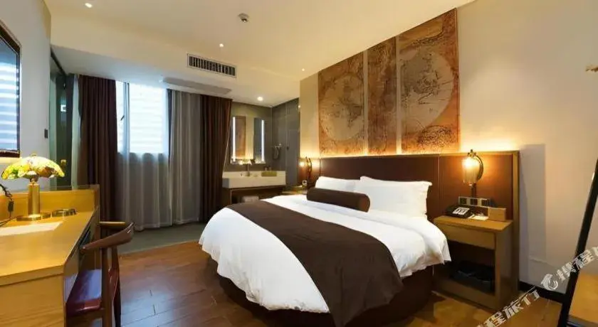 Bed in James Joyce Coffetel Guangzhou Dongxiaonan Metro Station Branch Bed in James Joyce Coffetel Guangzhou Dongxiaonan Metro Station Branch