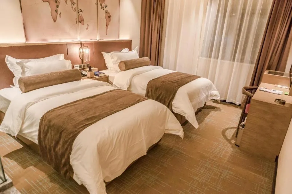 Bed in James Joyce Coffetel Guangzhou Dongxiaonan Metro Station Branch