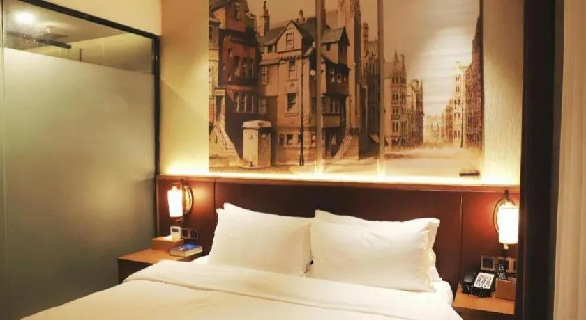 Bed in James Joyce Coffetel Guangzhou Dongxiaonan Metro Station Branch