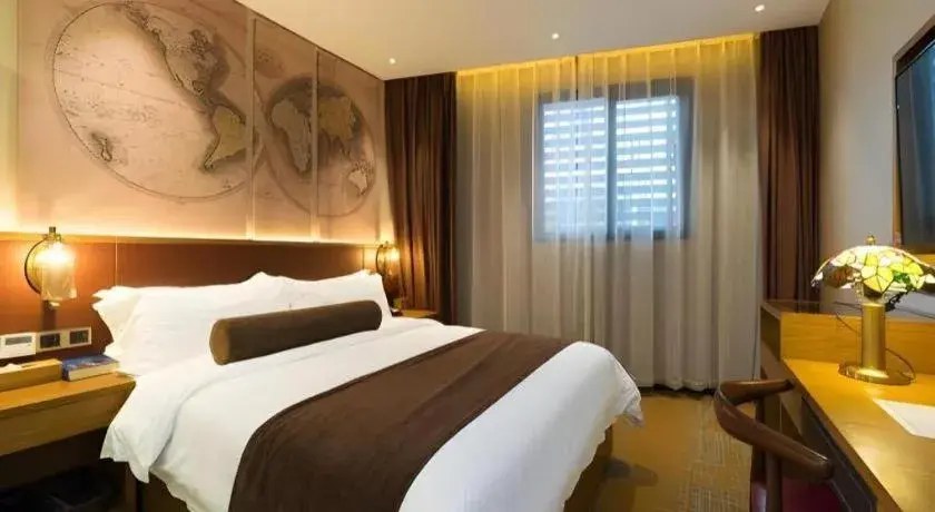 Bed in James Joyce Coffetel Guangzhou Dongxiaonan Metro Station Branch Bed in James Joyce Coffetel Guangzhou Dongxiaonan Metro Station Branch