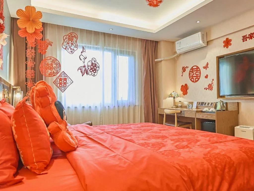 Bed in James Joyce Coffetel Xinyang Xixian Longhu Huayi