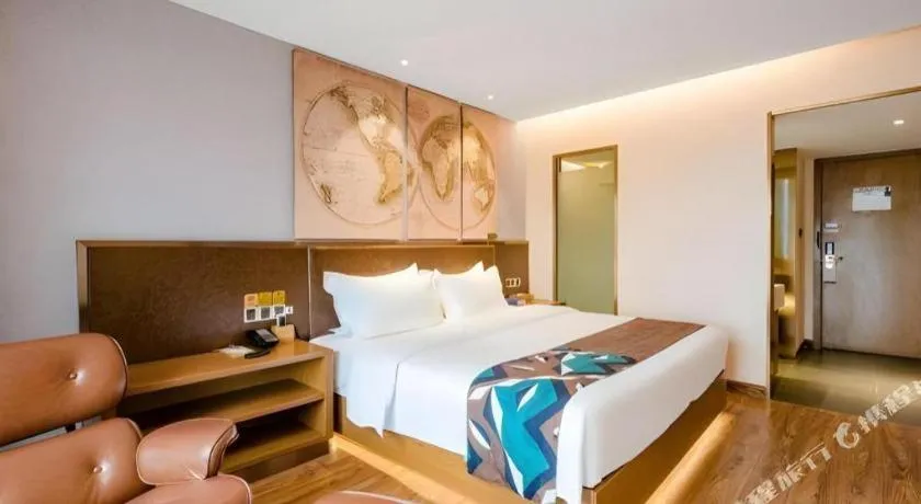 Bed in James Joyce Coffetel Xinyang Xixian Longhu Huayi