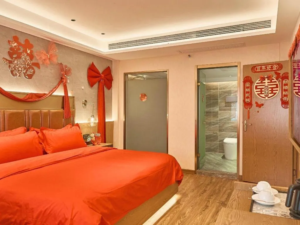 Bed in James Joyce Coffetel Xinyang Xixian Longhu Huayi