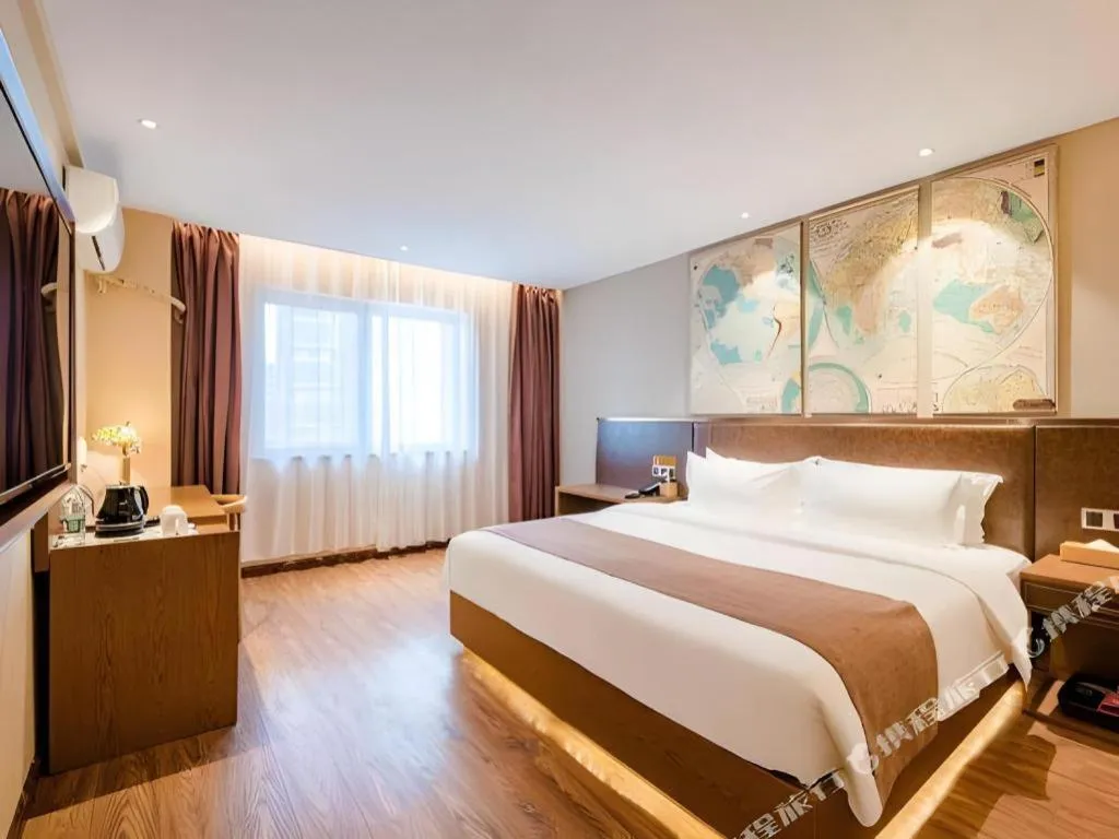 Bed in James Joyce Coffetel Xinyang Xixian Longhu Huayi