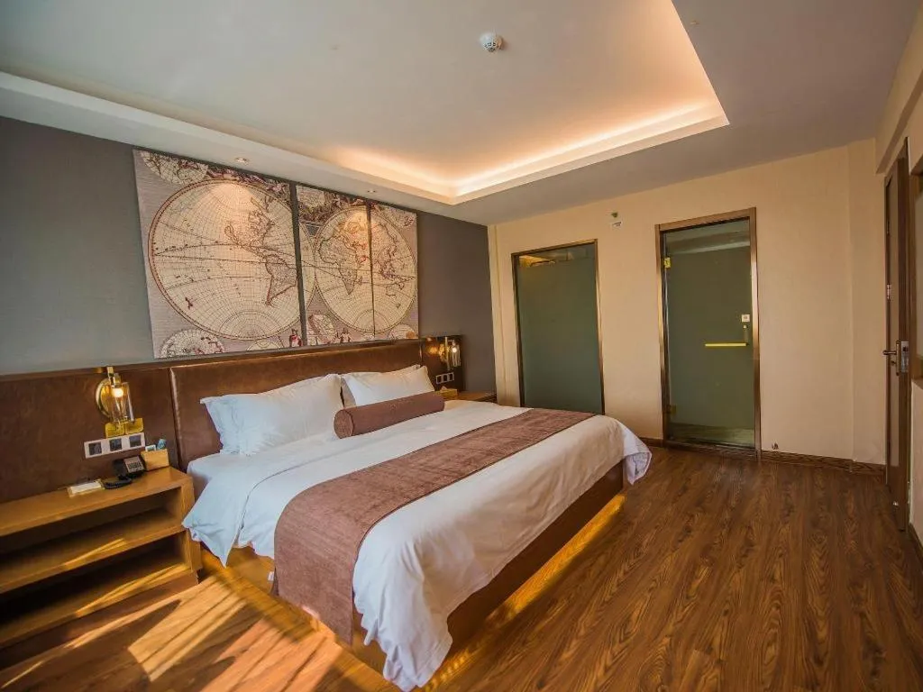 Bed in James Joyce Coffetel Xinyang Xixian Longhu Huayi