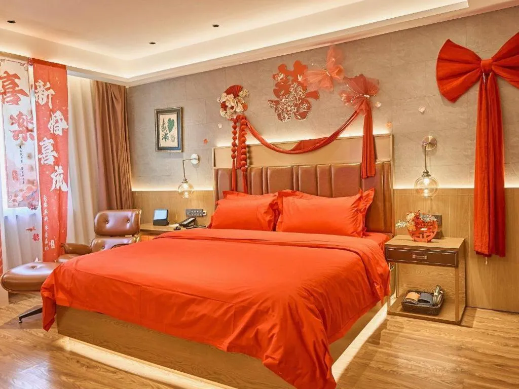 Bed in James Joyce Coffetel Xinyang Xixian Longhu Huayi