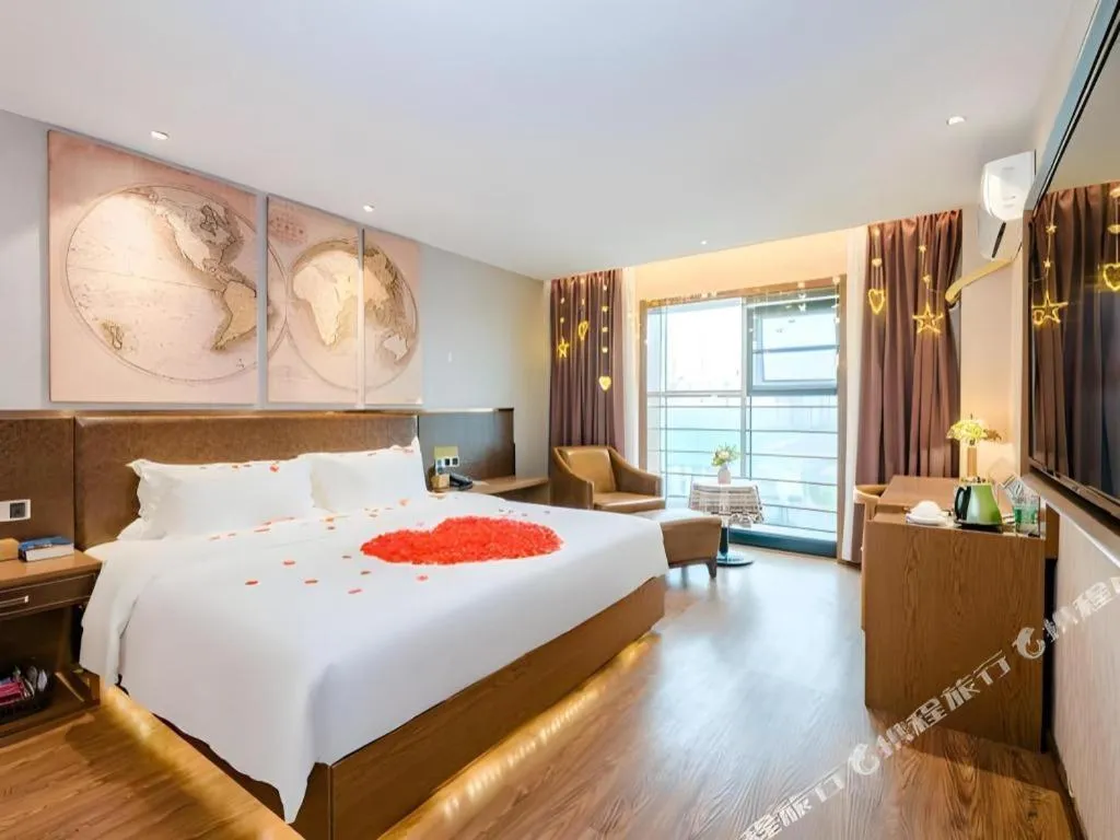 Bed in James Joyce Coffetel Xinyang Xixian Longhu Huayi