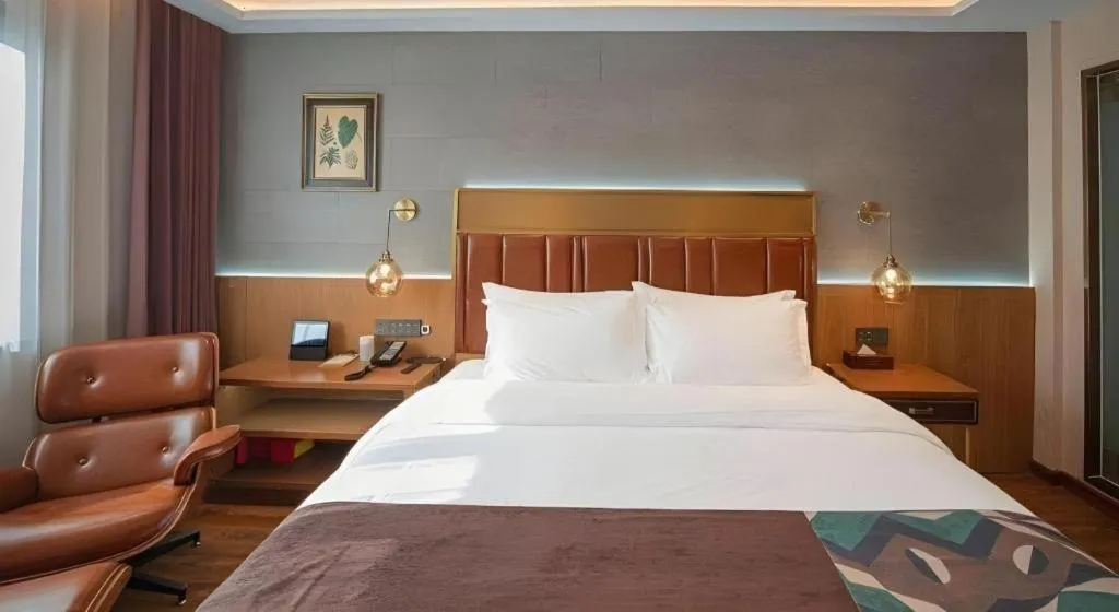 Bed in James Joyce Coffetel Xinyang Xixian Longhu Huayi