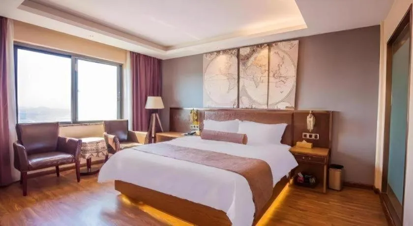 Bed in James Joyce Coffetel Xinyang Xixian Longhu Huayi