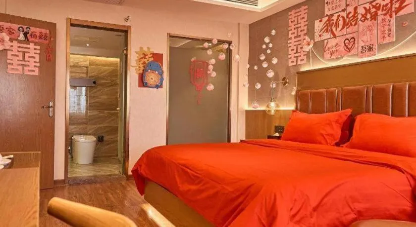 Bed in James Joyce Coffetel Xinyang Xixian Longhu Huayi