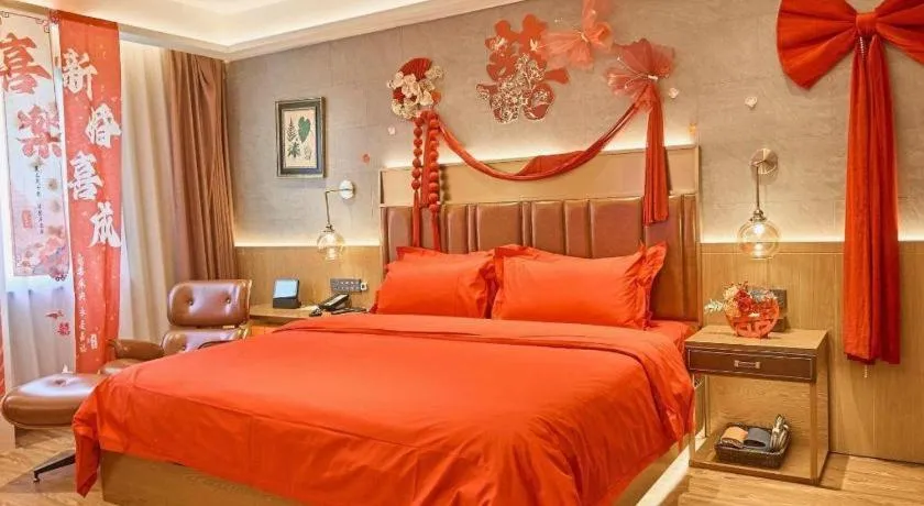 Bed in James Joyce Coffetel Xinyang Xixian Longhu Huayi