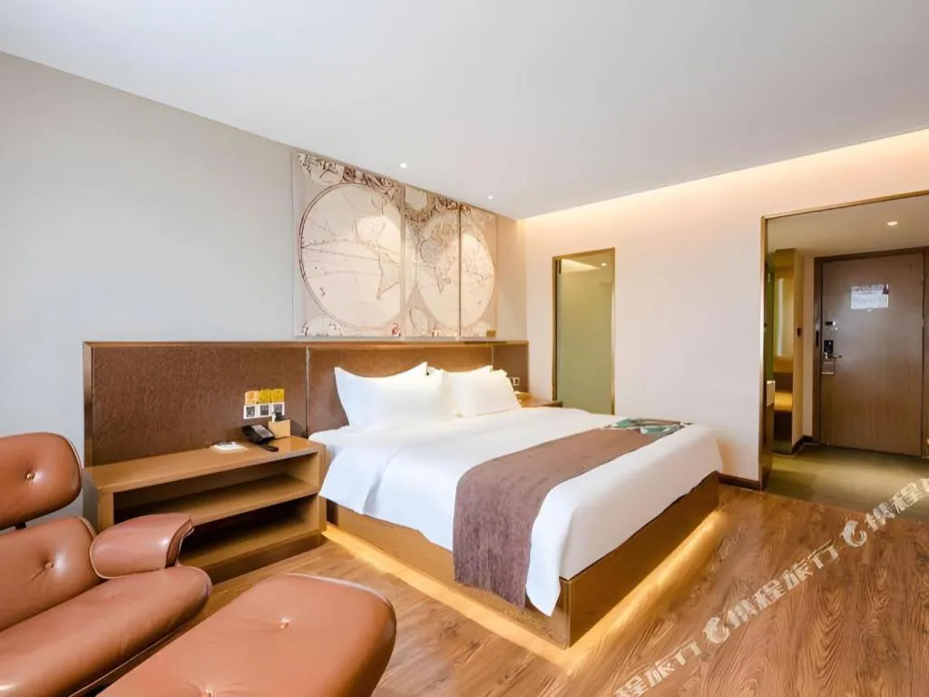 Bed in James Joyce Coffetel Xinyang Xixian Longhu Huayi