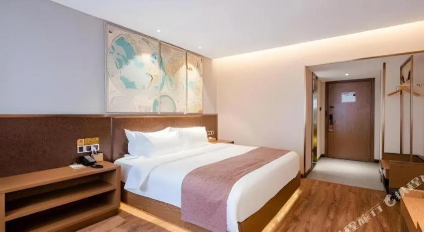 Bed in James Joyce Coffetel Xinyang Xixian Longhu Huayi