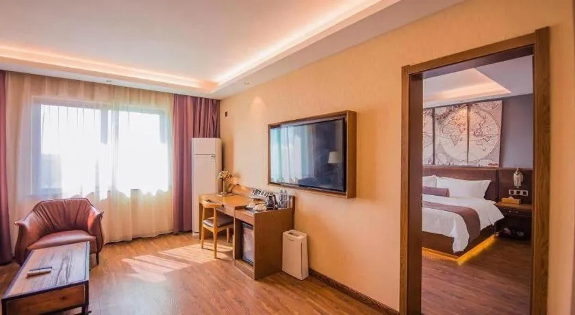 Bed in James Joyce Coffetel Xinyang Xixian Longhu Huayi