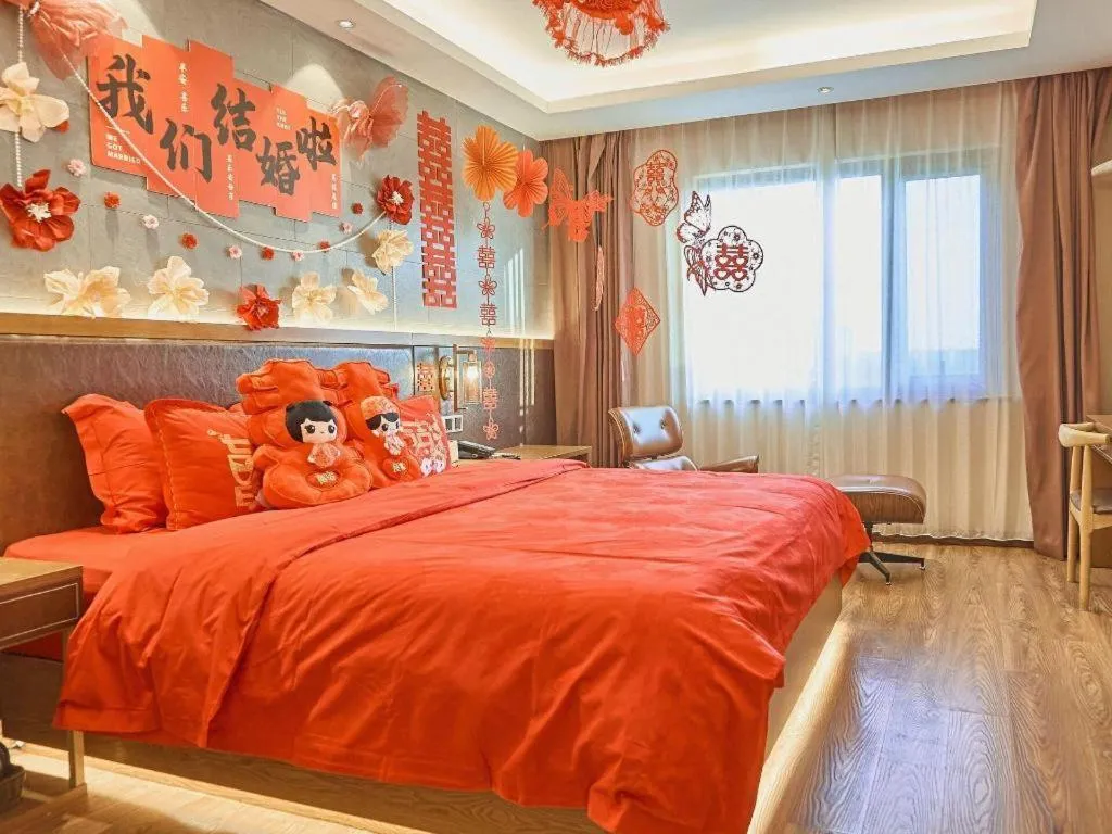 Bed in James Joyce Coffetel Xinyang Xixian Longhu Huayi