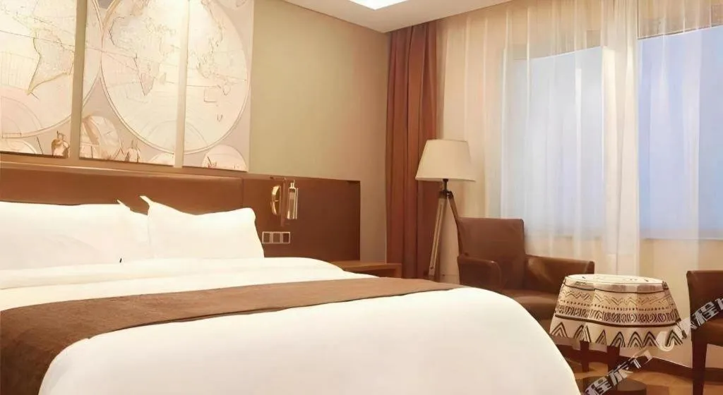 Bed in James Joyce Coffetel Xinyang Xixian Longhu Huayi