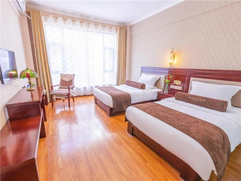 Bed in James Joyce Coffetel Dali Erhai Wetland Park