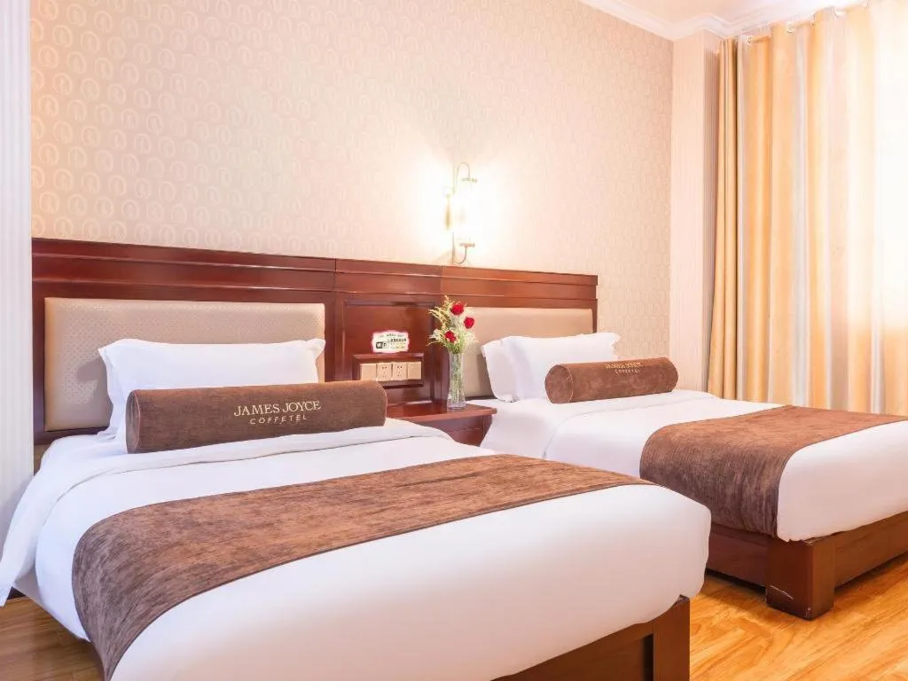 Bed in James Joyce Coffetel Dali Erhai Wetland Park