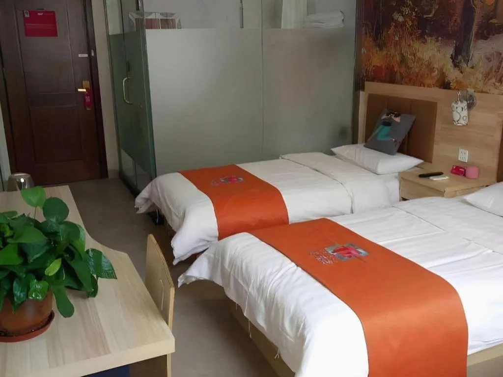 Bed in PAI Hotel Beijing Capital International Airport Linhe Development Zone