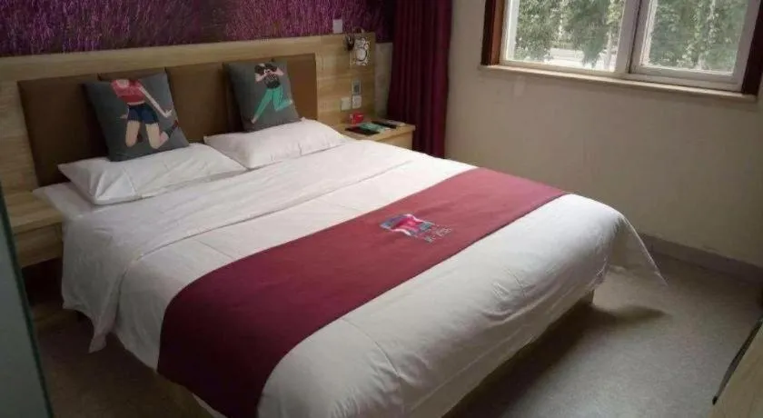 Bed in PAI Hotel Beijing Capital International Airport Linhe Development Zone