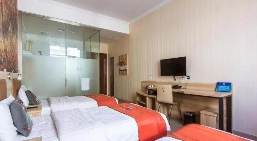 Bed in PAI Hotel Beijing Capital International Airport Linhe Development Zone