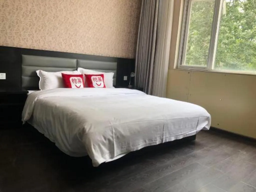 Bed in PAI Hotel Beijing Capital International Airport Linhe Development Zone
