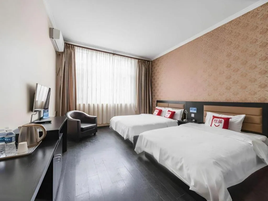 Bed in PAI Hotel Beijing Capital International Airport Linhe Development Zone