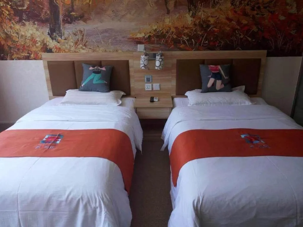 Bed in PAI Hotel Beijing Capital International Airport Linhe Development Zone