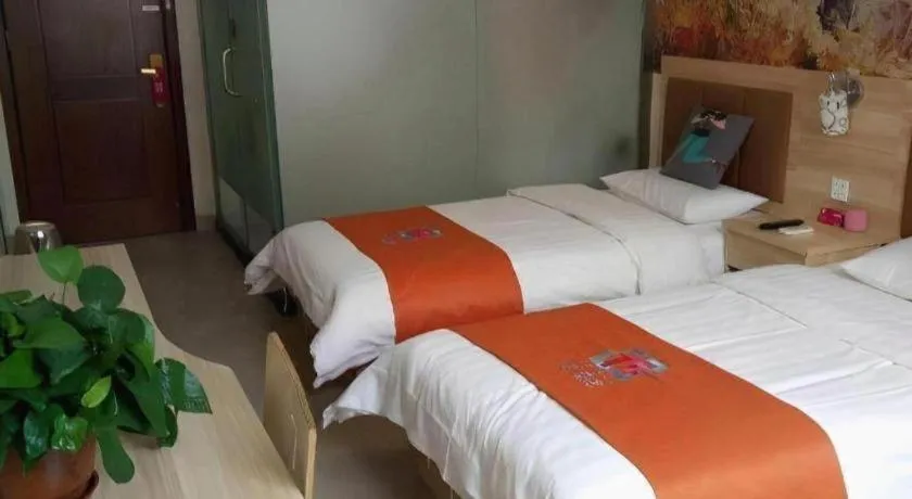 Bed in PAI Hotel Beijing Capital International Airport Linhe Development Zone