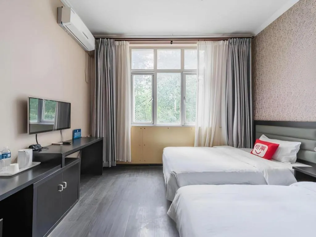 Bed in PAI Hotel Beijing Capital International Airport Linhe Development Zone