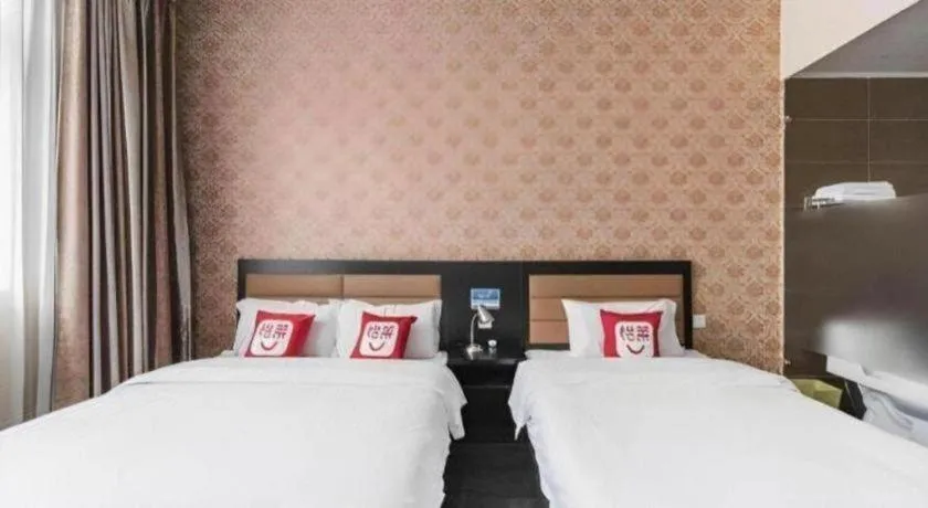 Bed in PAI Hotel Beijing Capital International Airport Linhe Development Zone