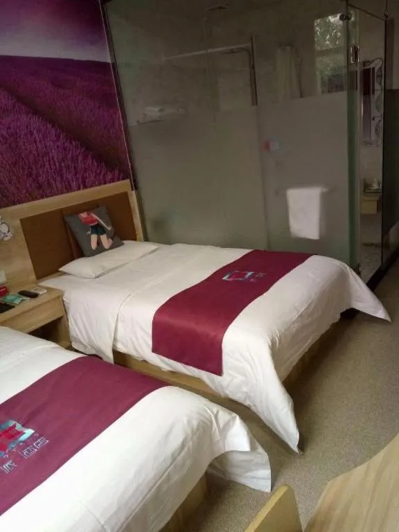 Bed in PAI Hotel Beijing Capital International Airport Linhe Development Zone