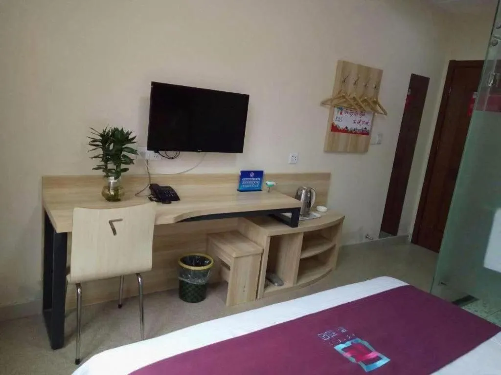 Bed in PAI Hotel Beijing Capital International Airport Linhe Development Zone