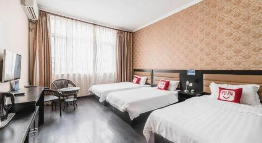 Bed in PAI Hotel Beijing Capital International Airport Linhe Development Zone