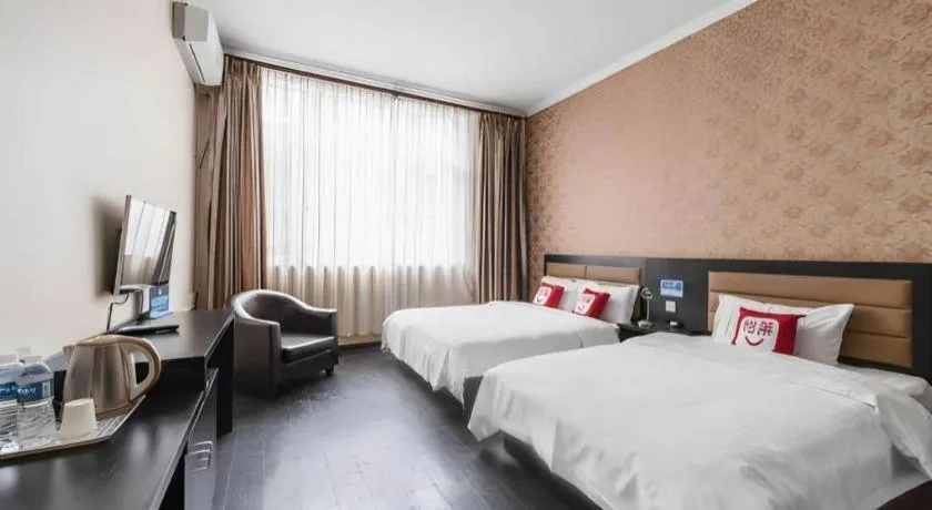 Bed in PAI Hotel Beijing Capital International Airport Linhe Development Zone