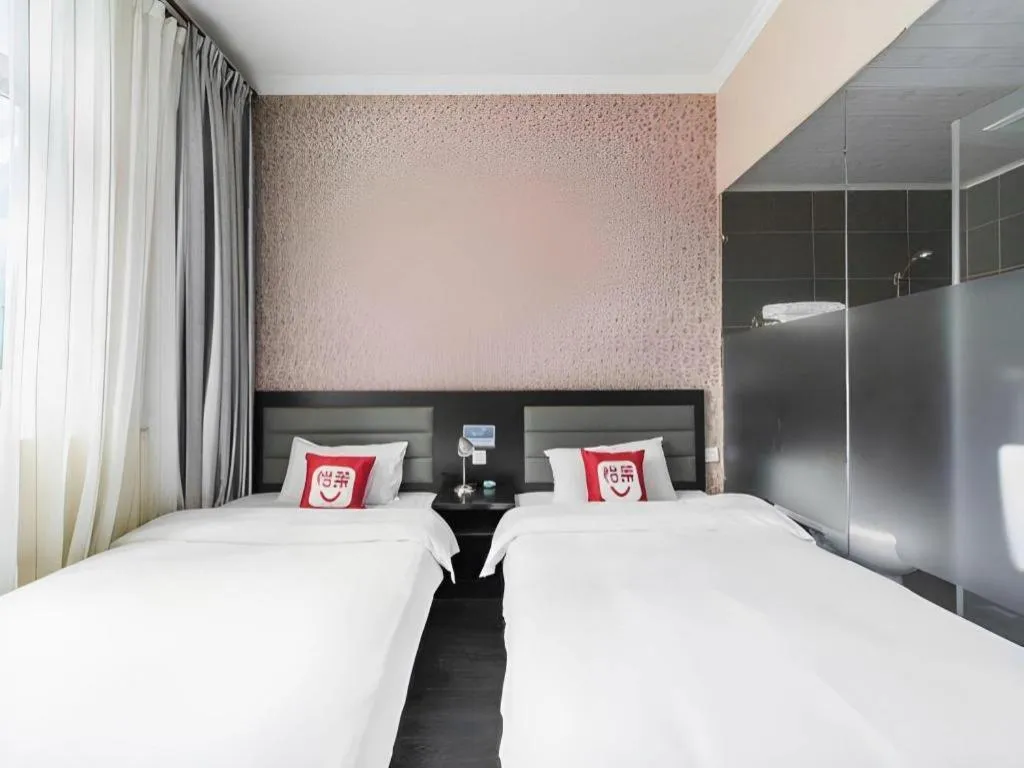 Bed in PAI Hotel Beijing Capital International Airport Linhe Development Zone