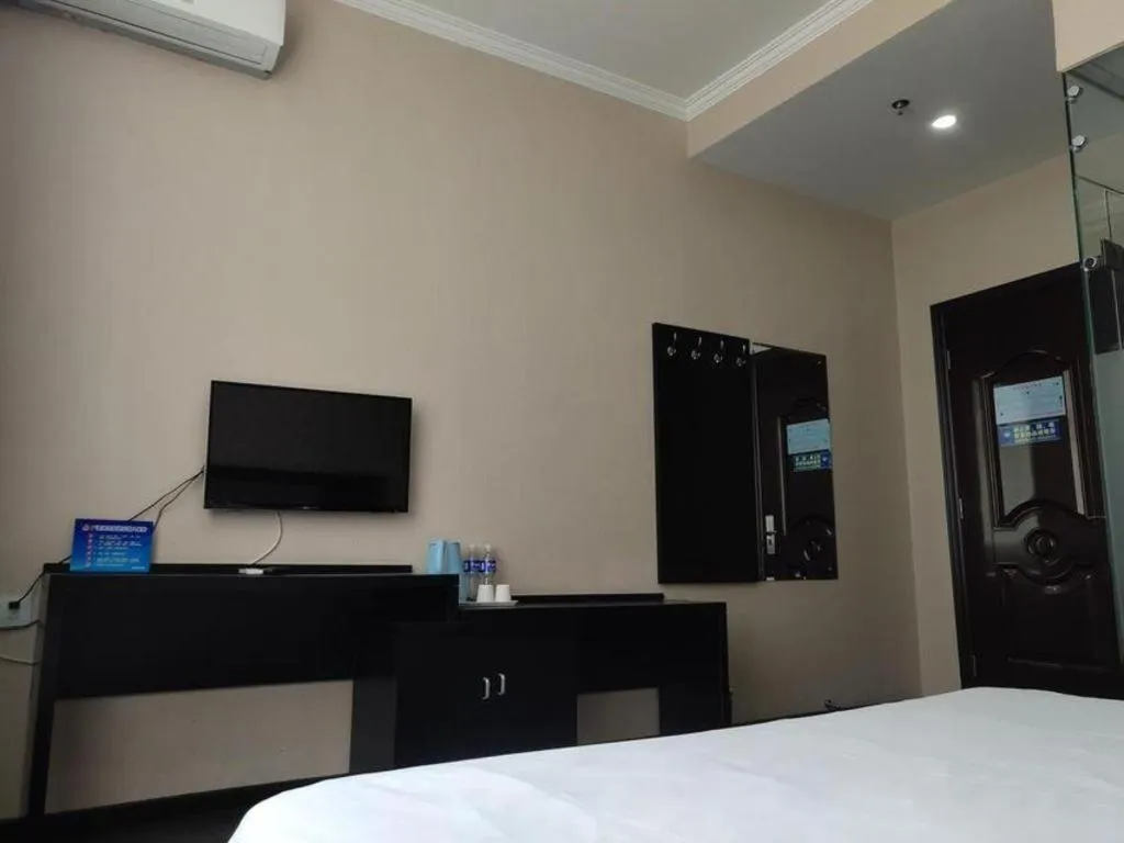 Bed in PAI Hotel Beijing Capital International Airport Linhe Development Zone