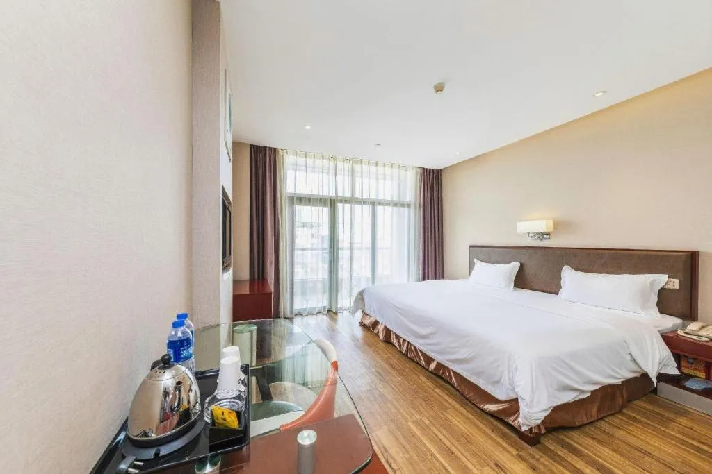 Bed in PAI Hotel Guangzhou North Gate of Chimelong Zoo