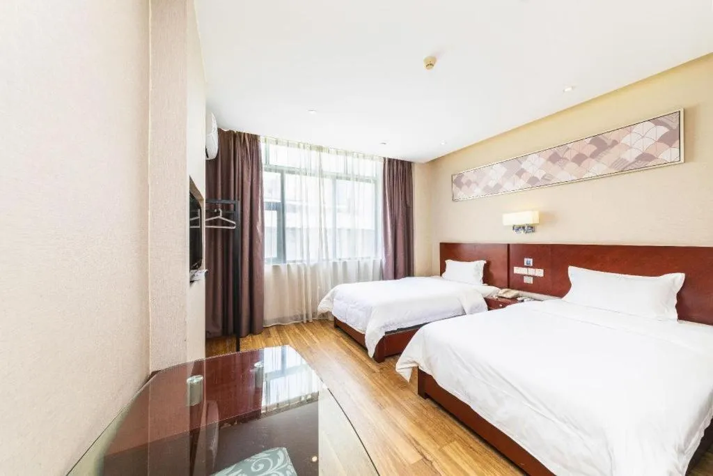 Bed in PAI Hotel Guangzhou North Gate of Chimelong Zoo