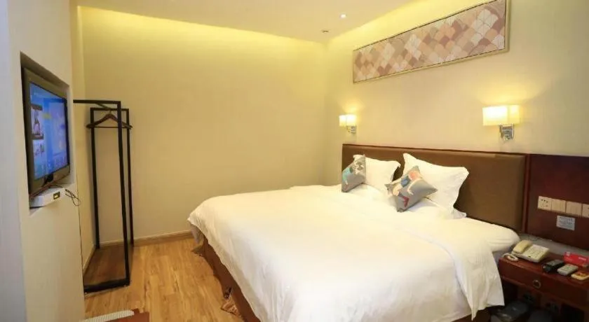 Bed in PAI Hotel Guangzhou North Gate of Chimelong Zoo