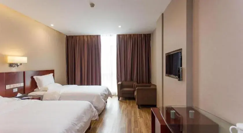 Bed in PAI Hotel Guangzhou North Gate of Chimelong Zoo Bed in PAI Hotel Guangzhou North Gate of Chimelong Zoo