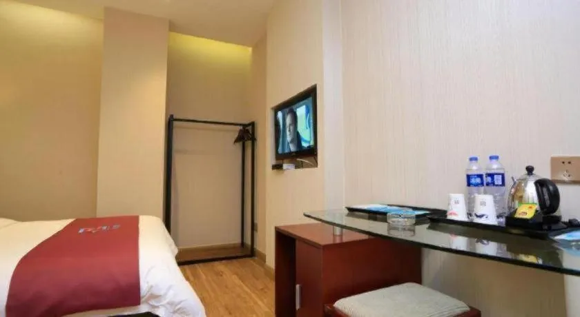 Bed in PAI Hotel Guangzhou North Gate of Chimelong Zoo