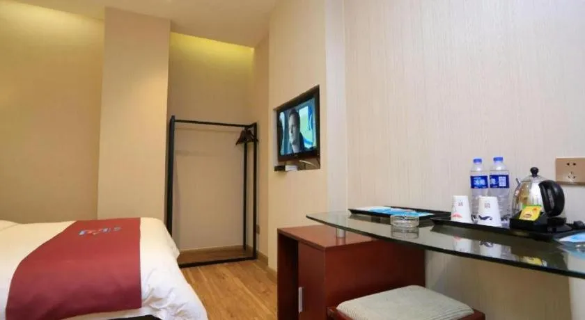 Bed in PAI Hotel Guangzhou North Gate of Chimelong Zoo