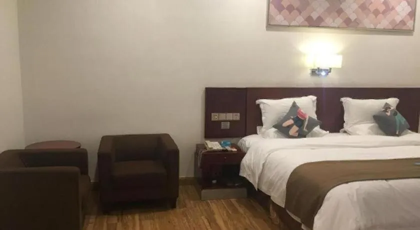 Bed in PAI Hotel Guangzhou North Gate of Chimelong Zoo