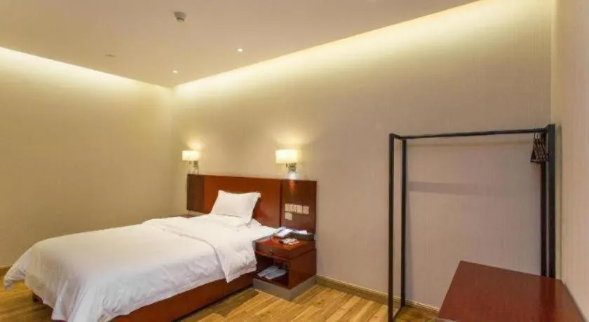 Bed in PAI Hotel Guangzhou North Gate of Chimelong Zoo