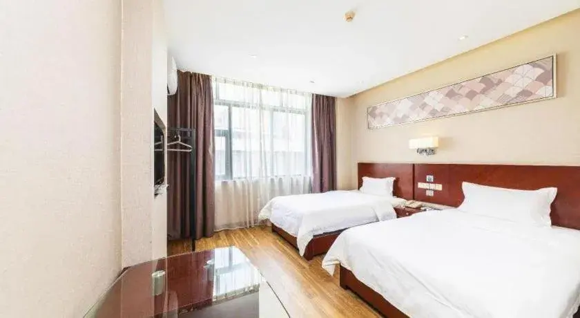 Bed in PAI Hotel Guangzhou North Gate of Chimelong Zoo Bed in PAI Hotel Guangzhou North Gate of Chimelong Zoo