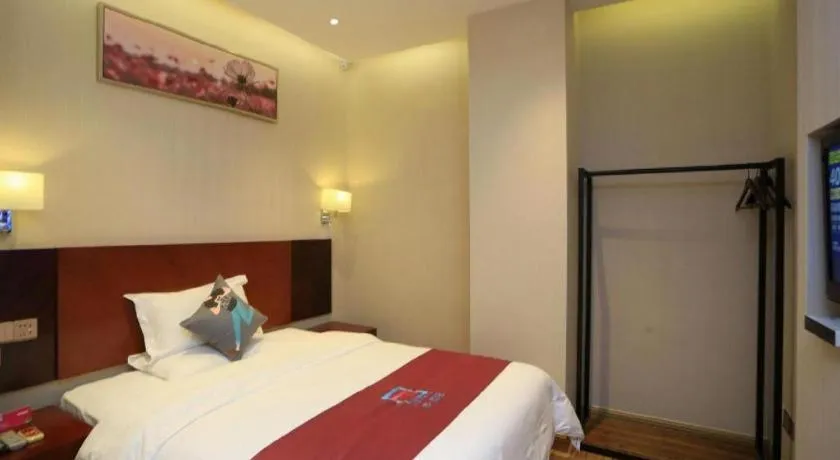 Bed in PAI Hotel Guangzhou North Gate of Chimelong Zoo