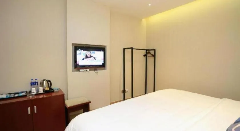 Bed in PAI Hotel Guangzhou North Gate of Chimelong Zoo