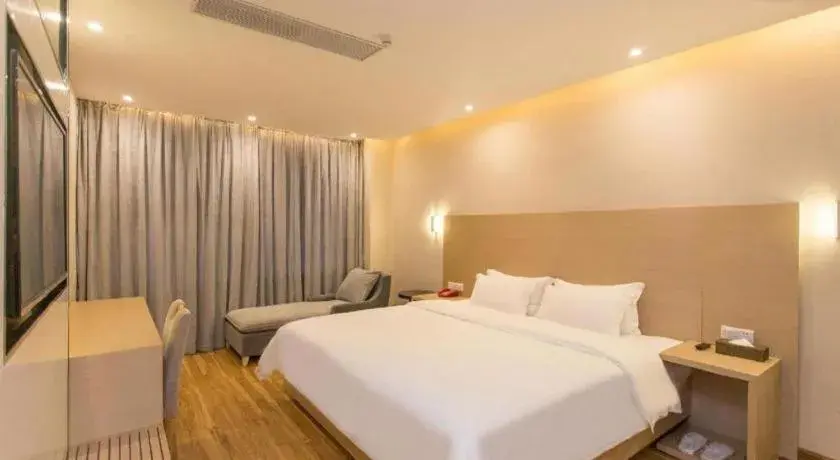 Bed in PAI Hotel Guangzhou North Gate of Chimelong Zoo Bed in PAI Hotel Guangzhou North Gate of Chimelong Zoo